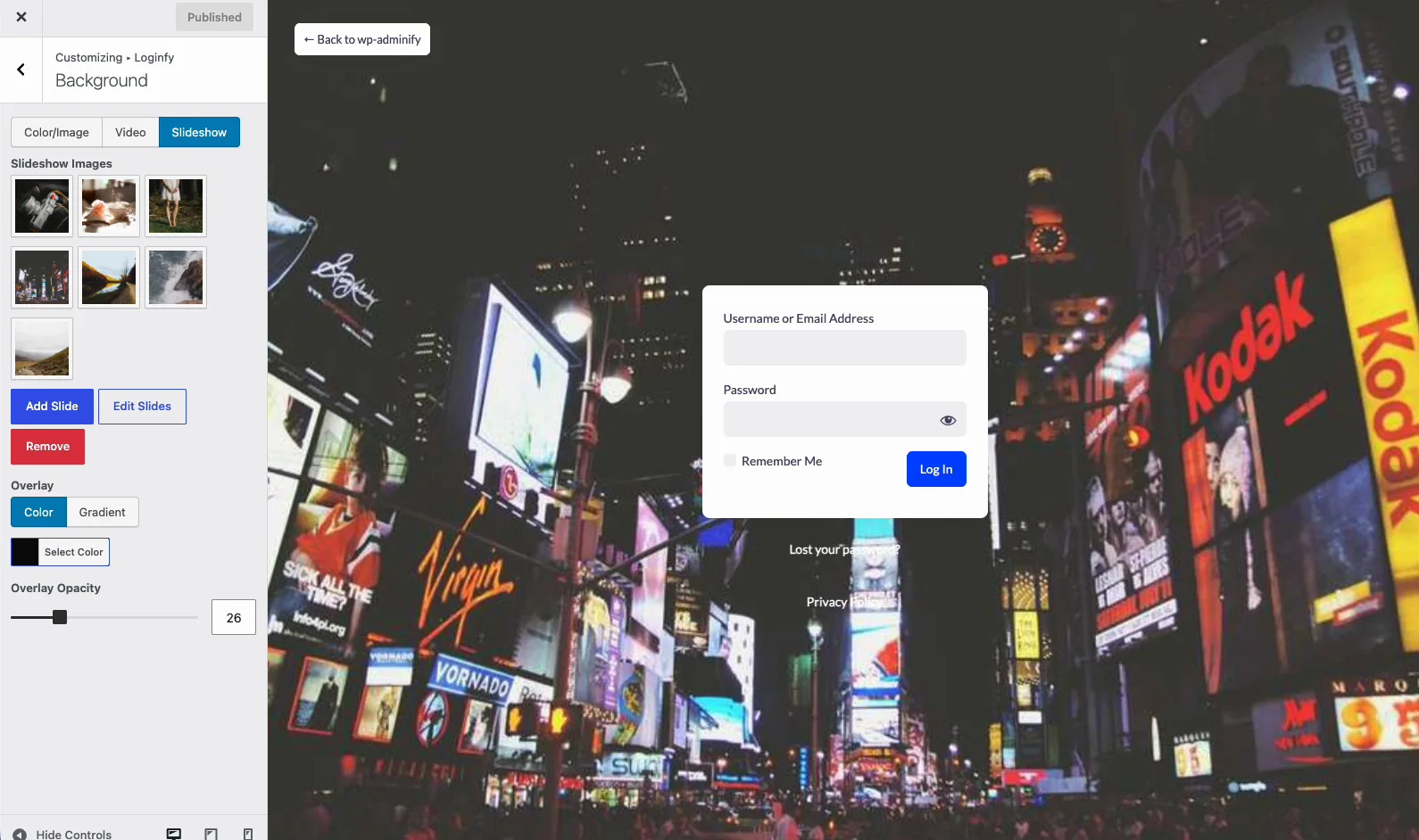 WordPress login form over a rotating slideshow background showing a night city scene
